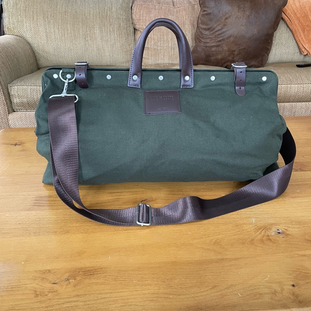Dark olive canvas weekender bag with Leather Accents.